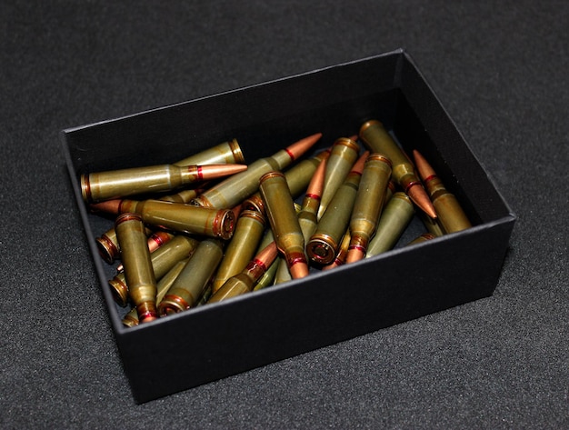 Unitary Cartridges In Black Box Scattered Isolated On Black Surface