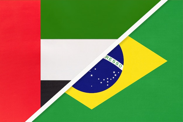 Photo united arab emirates or uae and brazil, symbol of two national flags from textile.