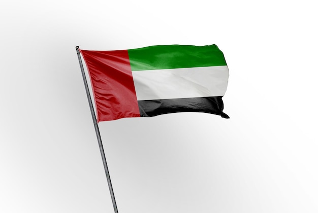 Foto united_arab_emirates zwaaiende vlag op een witte achtergrondafbeelding