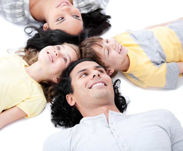 United family lying on the floor together