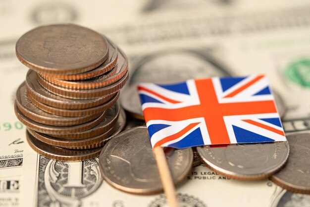 United Kingdom Flag on coins background Business and finance concept