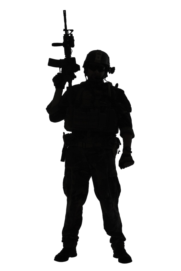 Photo united states marine corps special operations command marsoc raider with weapon. silhouette of of marine special operator white background full body