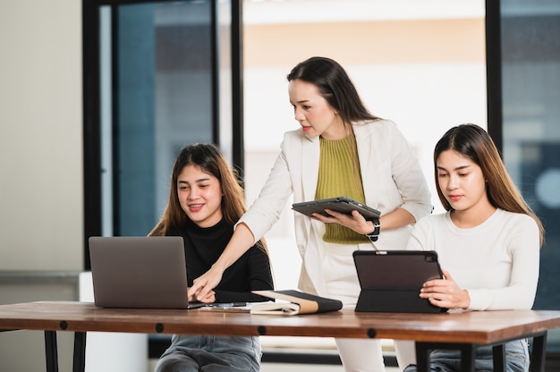 University professor giving lesson to students in classroom at University