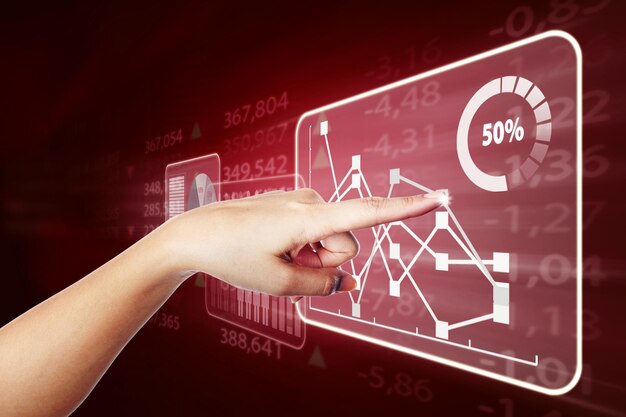 Unknown hand touching declining finance graph