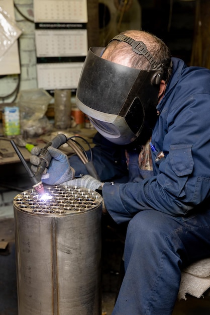 Unknown welder working in factory circa 2021 north east England