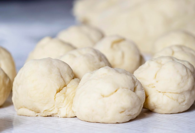 Unleavened dough on a sourdough table with flourThe concept of making homemade healthy baked goods