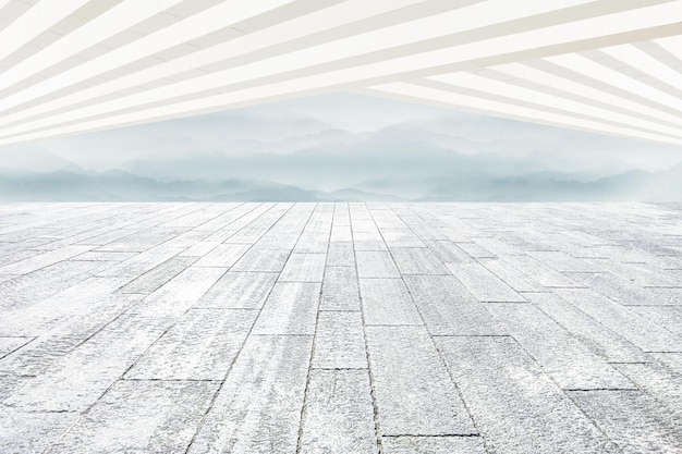 Unmanned brick square strip roof and ink mountains used for the\
background of car advertising