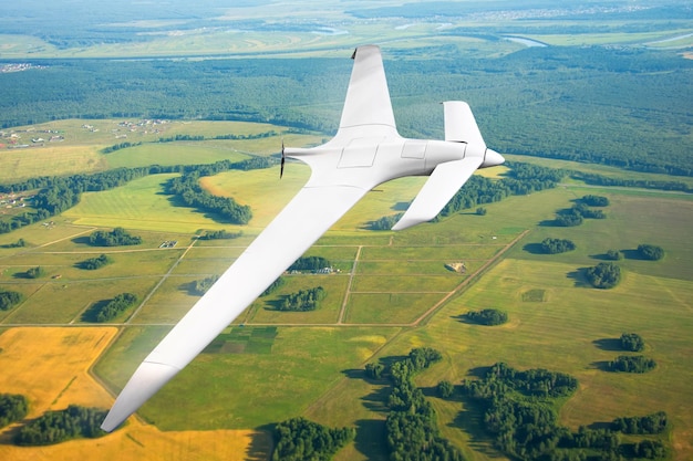 Unmanned military drone on patrol air territory at low altitude