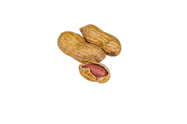 Unpeeled peanuts isolated on the white background