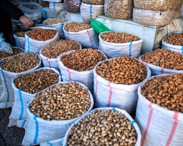 Unpeeled peanuts in the market