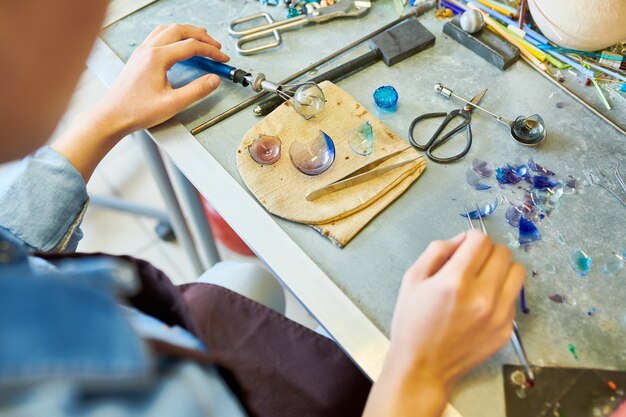 Unrecognizable Artist Making Glass Balls