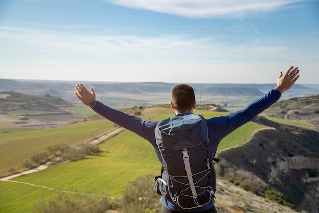 Unrecognizable young guy celebrating his victory with copy space