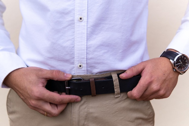 Unrecognizable young man with brown belt
