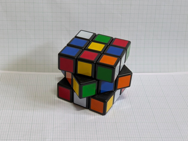 Unsolved rubik's cube on isolated background