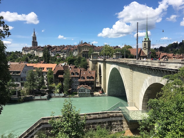 Photo untertorbrucke over aare river in city against sky