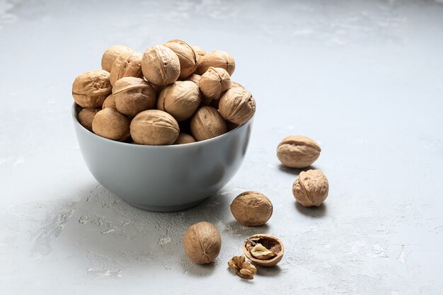 Untreated walnut in a bowl