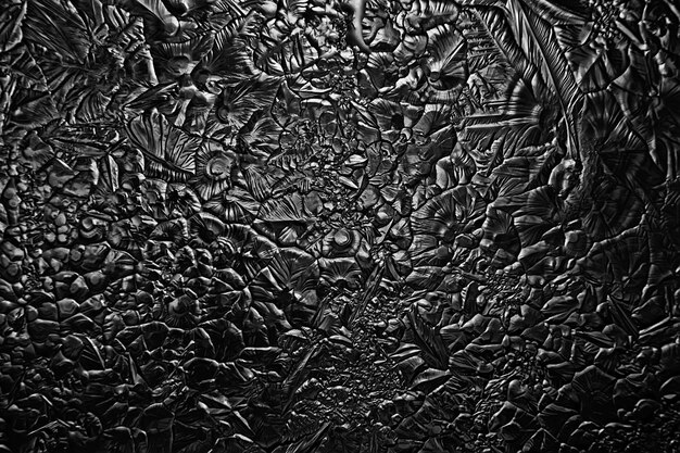 珍しい抽象的な背景の氷の金属のテクスチャのひびの入った表面、現代アートの背景