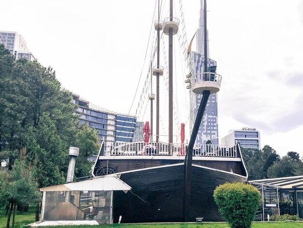 Unusual interesting restaurant in the form of an old sailing ship in the park in the middle