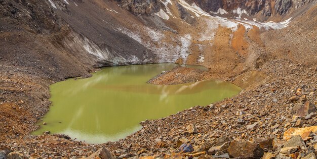 Unusual lake at the bottom of a mountain circus