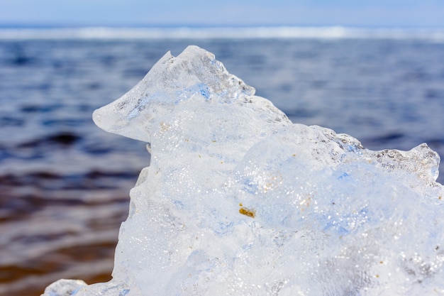 Unusual shapes and textures of ice crystals close-up shallow dof with copy space. Arctic, winter and spring landscape.