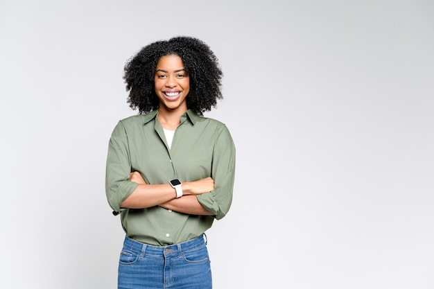 an upbeat africanamerican woman showcases a relaxed yet confident stance