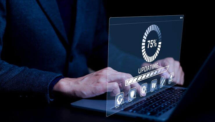 Photo update software application and hardware upgrade technology concept user is using a notebook software update or operating system upgrade updating progress bar on computer screen install app patch