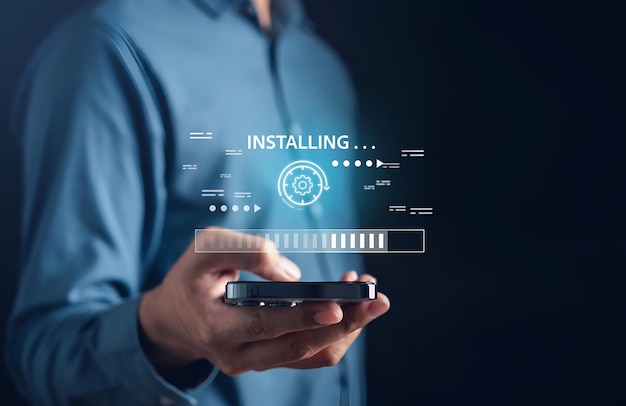 Update software system in computer Man using smartphone upgrade program Business technology internet loading virtual bar with installing the update for the quality better