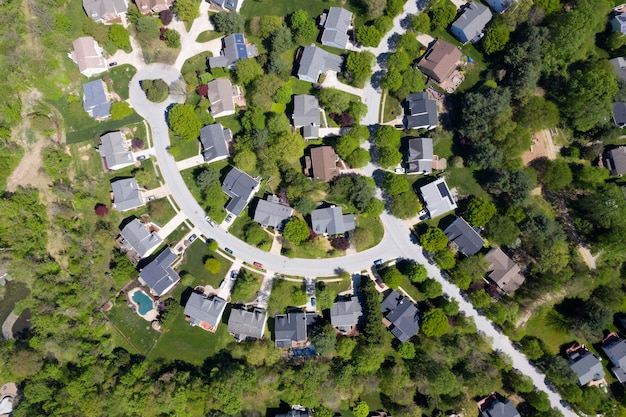 Upper middle class american neighborhood with curving street in Maryland