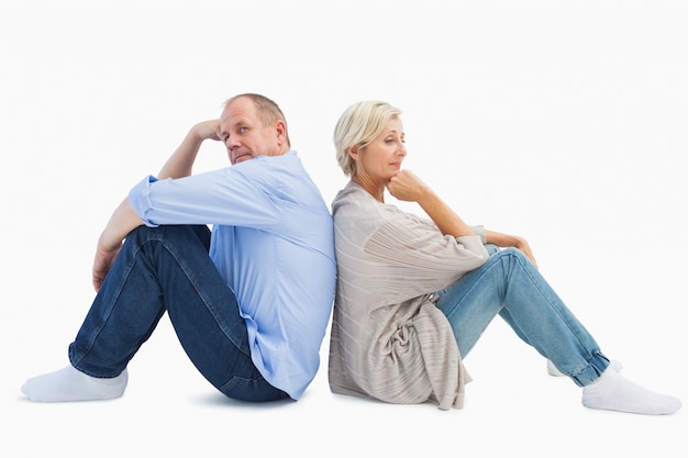 Upset mature couple not talking