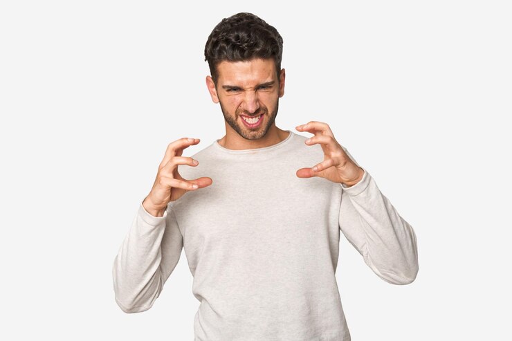 Photo upset screaming with tense hands
