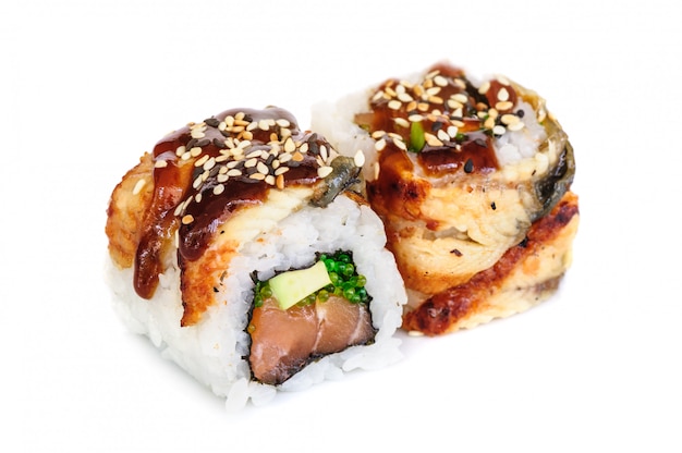 Uramaki maki sushi, two rolls isolated on white