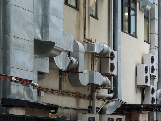 Urban building exterior with ventilation ductwork