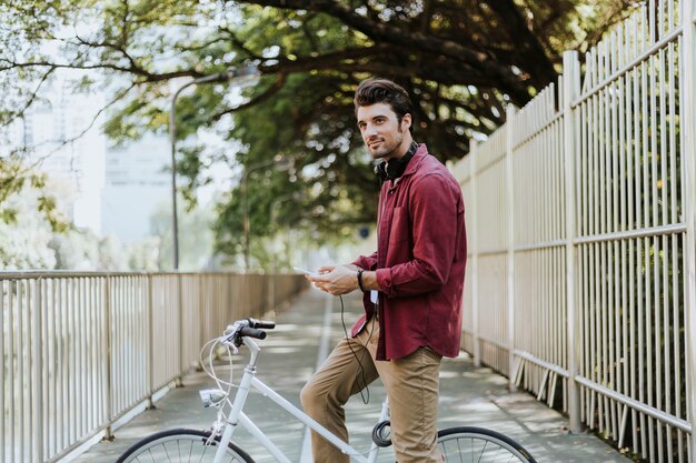 Urban cyclist listening to music