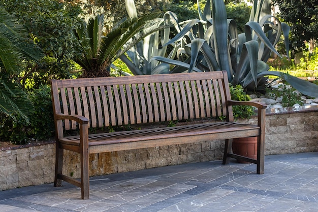 Urban landscape Rectangular wooden bench in the park a place to relax