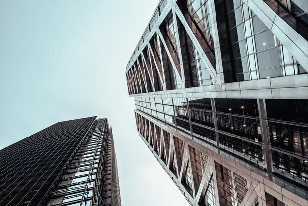 Urban landscape of steel and glass Futuristic architecture and sky Split tone processing