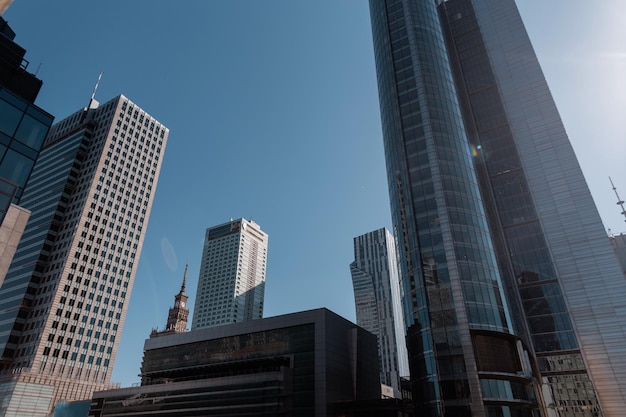 Urban modern city with glasses business and finance buildings with blue sky Warszawa Poland