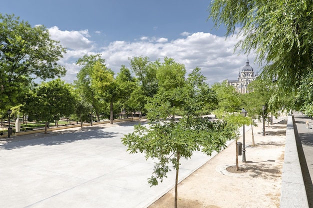 Urban park with views of the Almudena cathedral in the city of Madrid