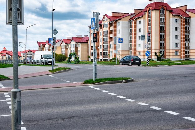 Urban pedestrian crossing with traffic lights.