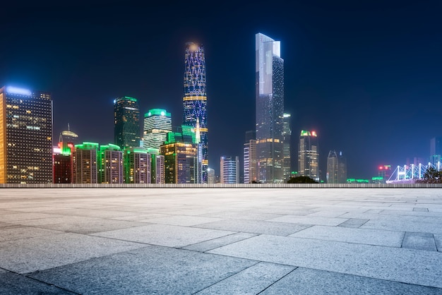 Urban skyscrapers with empty square floor tiles