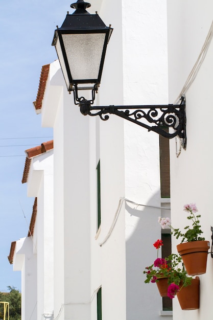 Urban view of the typical white houses with red rooftops located in Portugal.