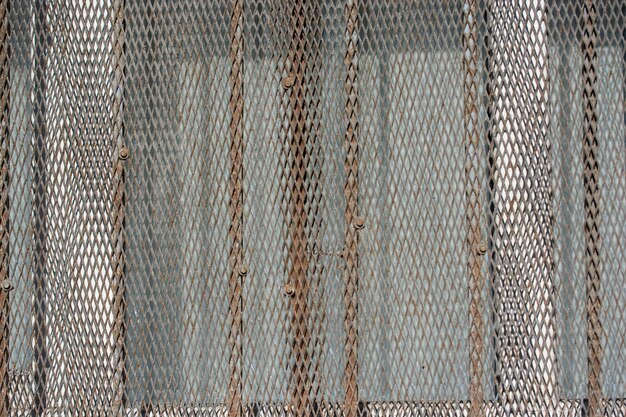 Urban welded metal grid texture as background