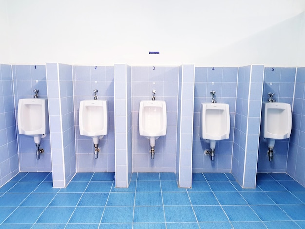 Photo urinals in public restroom