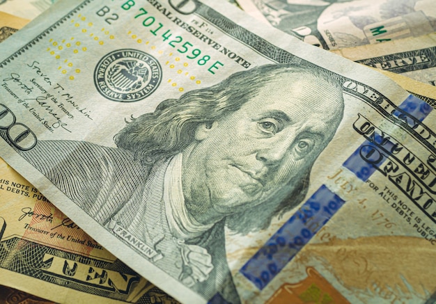 US dollar banknotes in closeup photography