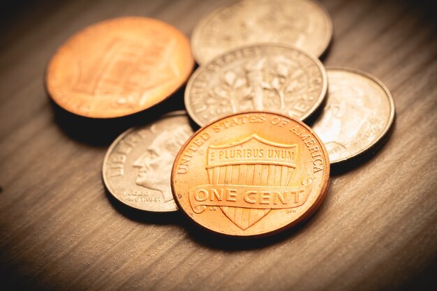 US dollar coins in closeup photography