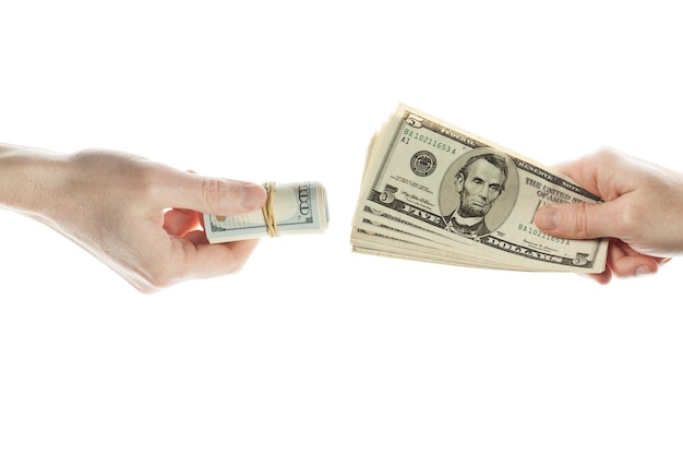 us dollars cash money in giving hand and taking hand isolated on white
