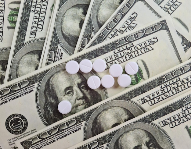 US dollars with ecstasy harcotics pills and health care costs