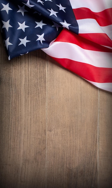 US flag on wooden background N