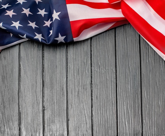 US flag on wooden background