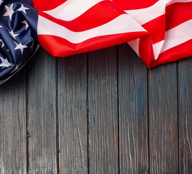 US flag on wooden background