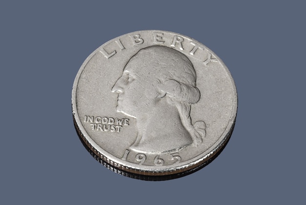 US quarter dollar coin on dark background